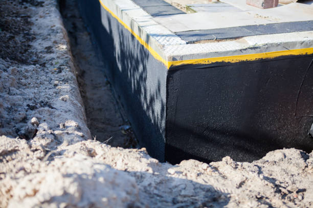 Professional Waterproofing technician working in Williston, OH
